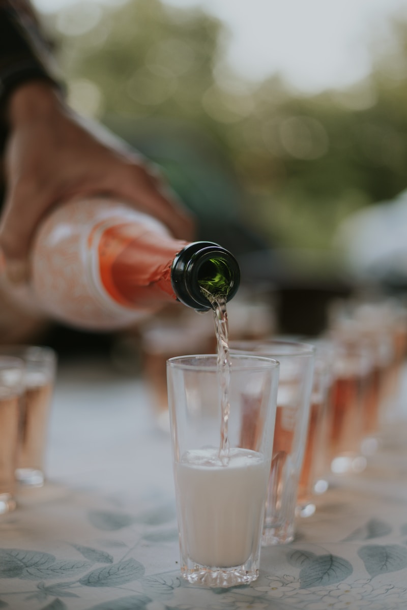 Photo by eliza cemme Sparkling wine being poured into glasses